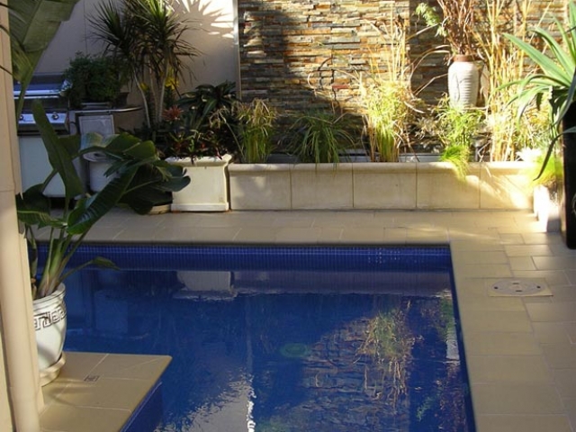 L shaped pool in afternoon lighting