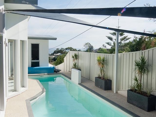 modern customised pool bespoke with shade sail