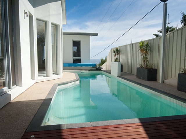 customised in ground pool with solar blanket